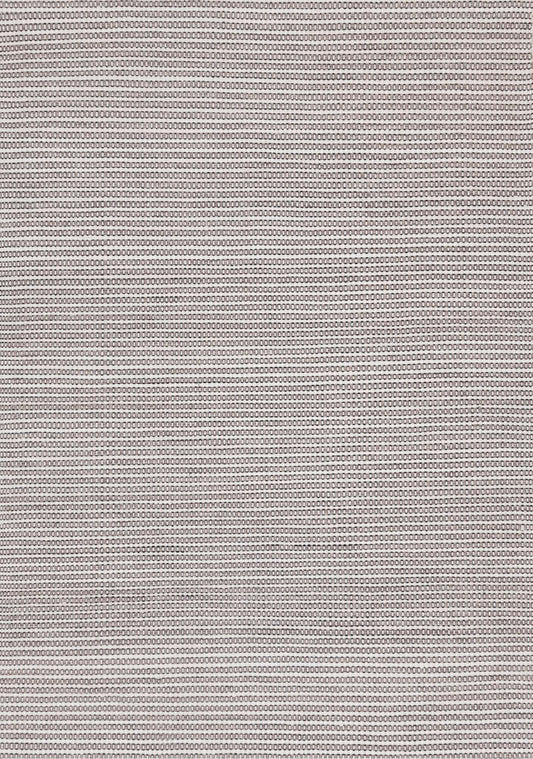 With its muted, natural tones, this rug blends seamlessly with a wide array of interiors