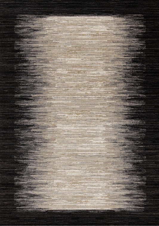 Textured area rug with a gradient pattern transitioning from black to beige.