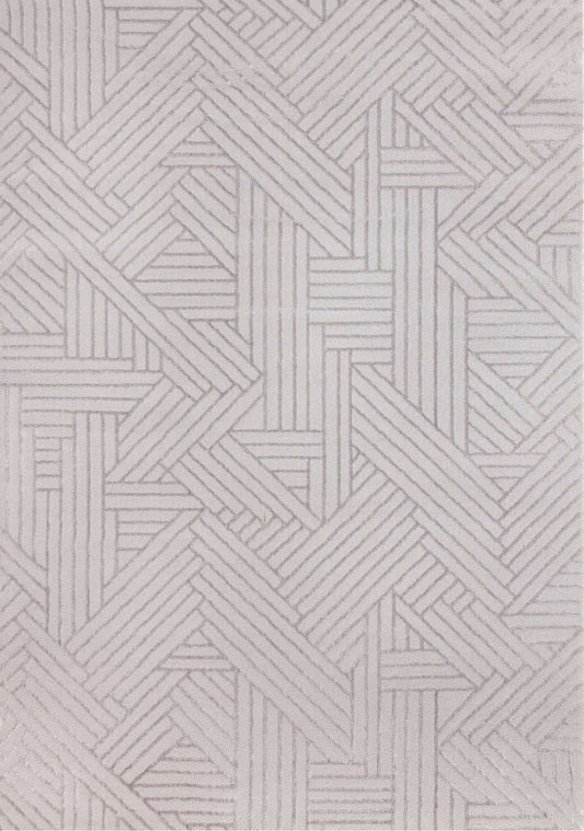Geometric patterned rug with interlocking shapes on a neutral background